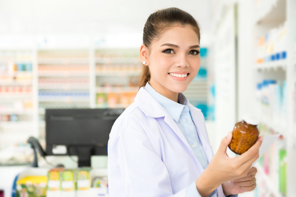 Female pharmacist or pharmacy technician